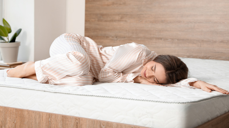 woman lying in bed