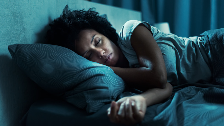 Woman suffering from sleep paralysis