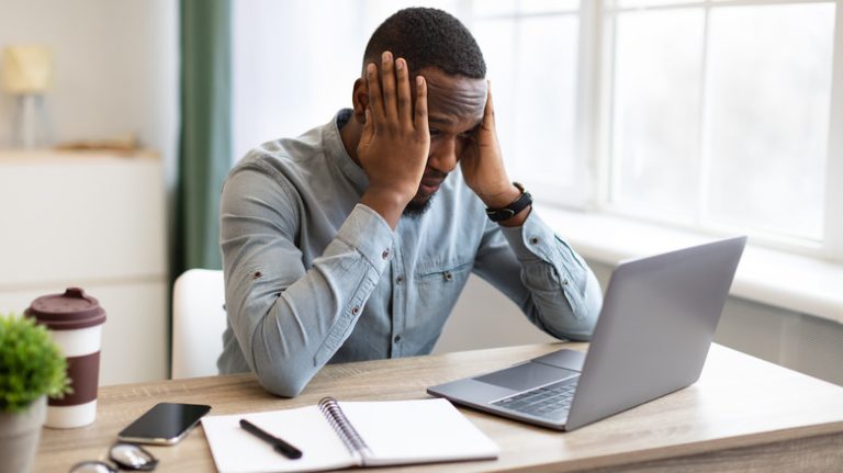 Anxious man at desk