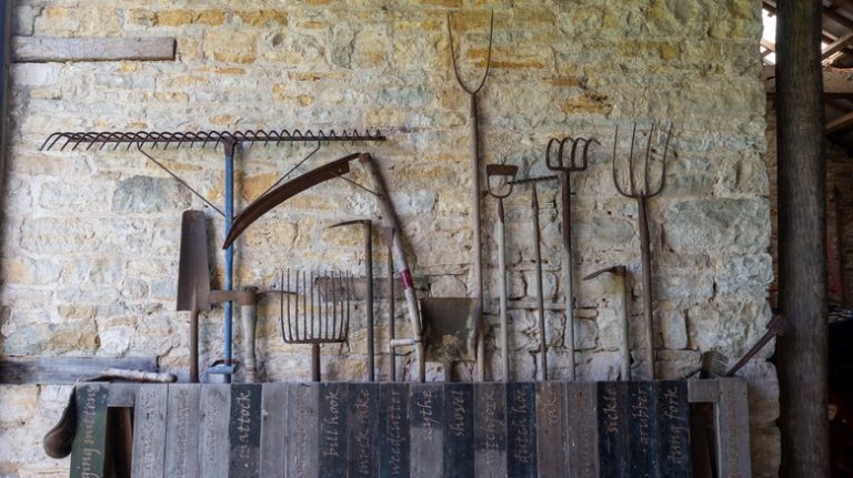 antique farming tools lined up