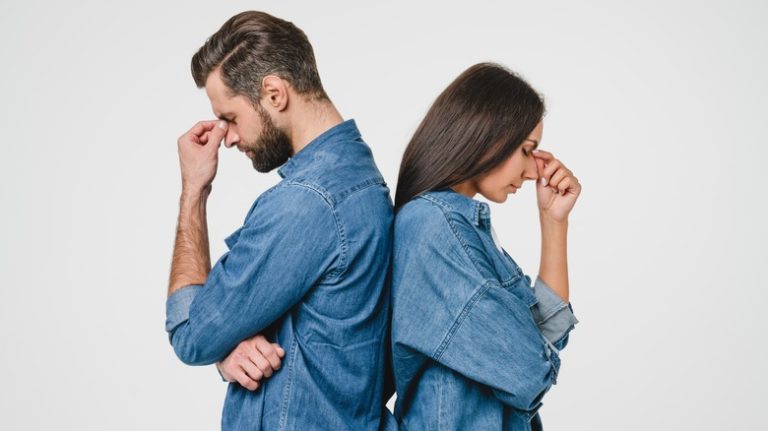 couple standing depressed