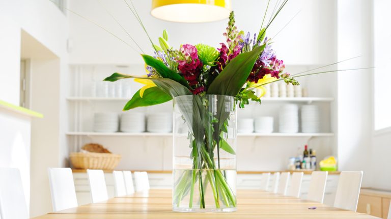 fresh flowers in clear liquid