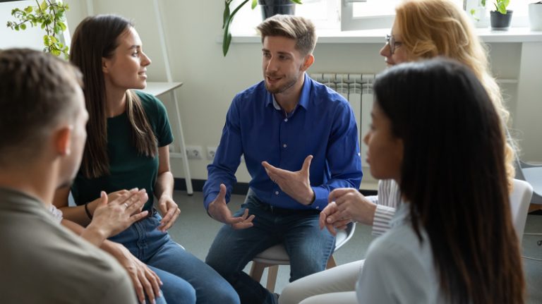 People talking in group therapy