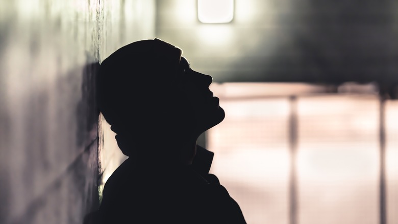 male silhouette hallway