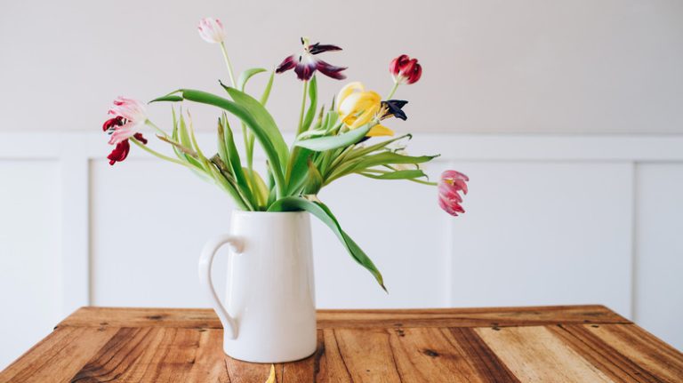 wilting flowers in vase