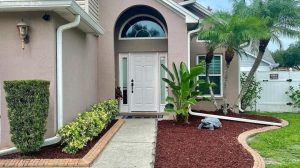 Front yard with mulch landscape
