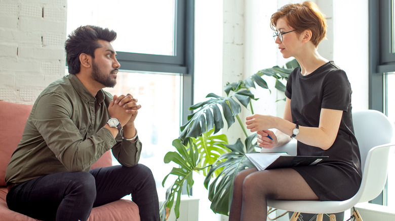 Patient talking with psychotherapist