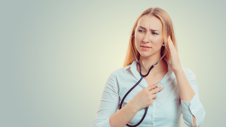 woman checking her heart rate