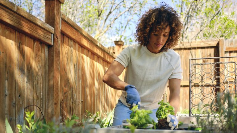 Woman planting a garden