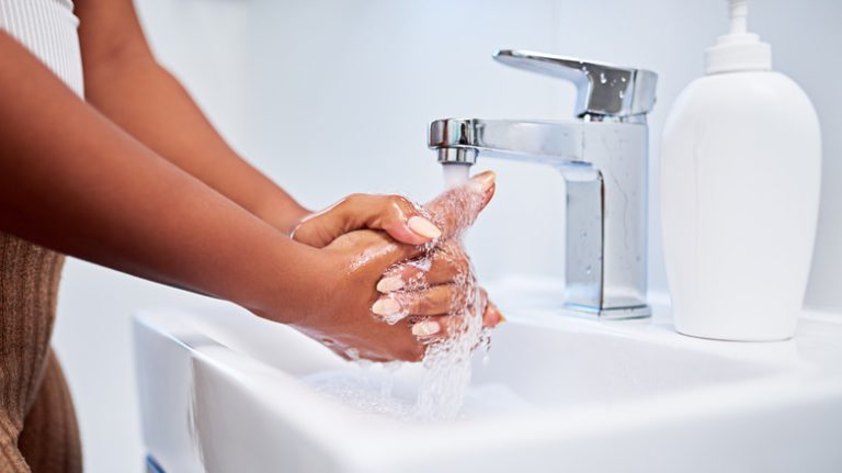 Woman washing hands