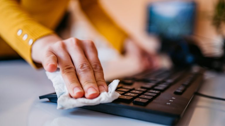 Wiping a keyboard with cloth