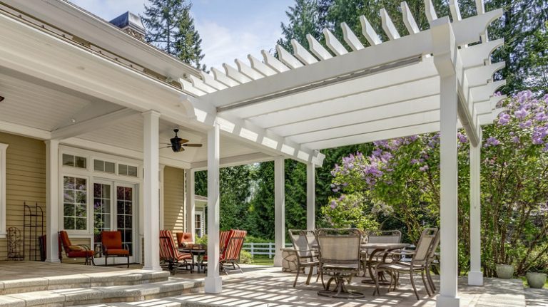 Back patio with white pergola