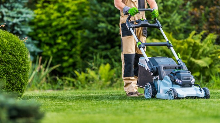 Person mowing lawn