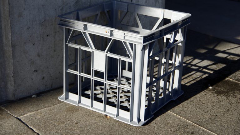 Transform an Old Milk Crate into a Clever Hidden Storage Solution